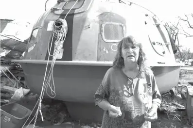  ?? Corpus Christi Caller-Times via AP ?? n Linda Castor, a resident of Holiday Beach in Aransas County, Texas, is shown Sept. 6. Castor bought a pod years ago and invited two others to stay in it as Hurricane Harvey made landfall on Aug. 26. She said the pod saved their lives.