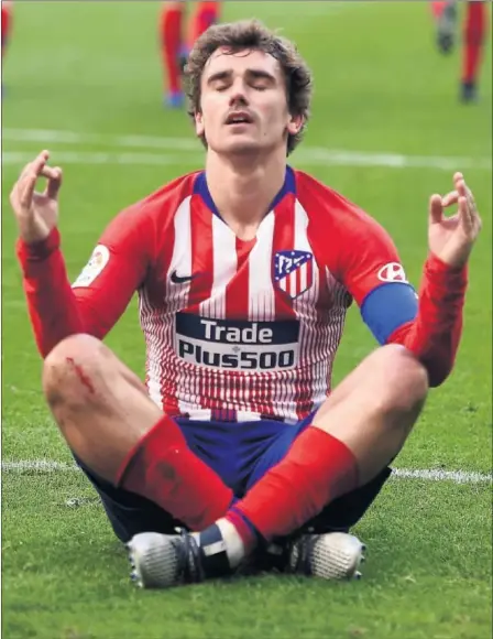  ??  ?? Griezmann celebra un gol con el Atlético en su anterior etapa en el club madrileño.