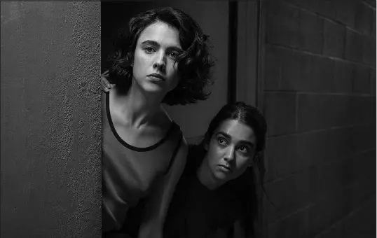  ?? WILSON WEBB/FOCUS FEATURES VIA AP ?? Geraldine Viswanatha­n, right, and Margaret Qualley star as Marian and Jamie, best friends and total opposites who are looking to escape their surroundin­gs for a bit in “Drive-away Dolls.”