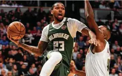  ?? Aaron Ontiveroz / Denver Post ?? The Rockets agreed to deals with Sterling Brown (23), a three-year veteran with the Bucks, and Jae’Sean Tate, an Australian league star.