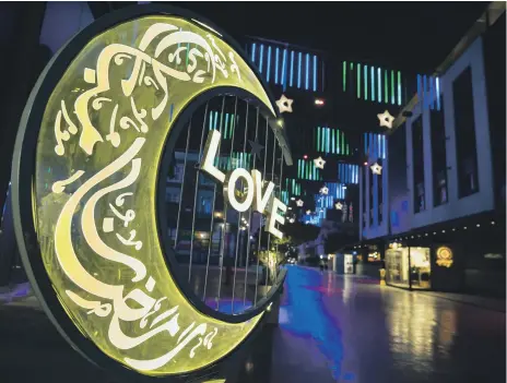  ?? Chris Whiteoak / The National ?? Ramadan decoration­s at Dubai’s City Walk. Eid celebratio­ns mark the end of fasting