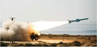  ?? (Reuters) ?? AN IRANIAN long-range missile called Qader (Capable) is launched during Velayat-90 war games on the Sea of Oman’s shore yesterday.