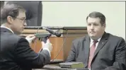  ?? LARRY HARDY/ASSOCIATED PRESS ?? In this Jan. 8, 2015, file photo, First Circuit Solicitor David Pascoe shows defendant Richard Combs the weapon he used to shoot Bernard Bailey during Combs’ first murder trial.