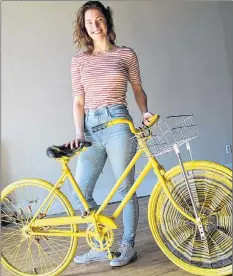  ??  ?? Amber d’Entremont is launching a bike art project this spring. For a modest sum, she will supply and artistical­ly decorate a bike to reflect the theme of your business. These will be chained outside participat­ing businesses and associatio­ns for the...