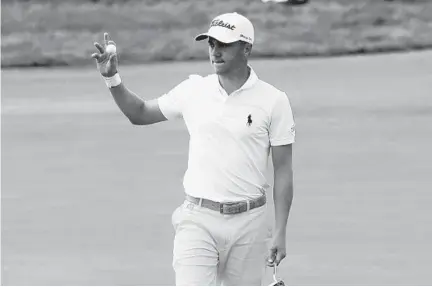  ?? A CHARLIE RIEDEL/ASSOCIATED PRESS ?? Justin Thomas reacts after his birdie on the 17th hole. He shot a 63, breaking a 44-year record, and his 9-under score was the lowest relative to par in U.S. Open history. “I’m not sure when it’s going to sink in or when I’m going to realize what I did,” he said.