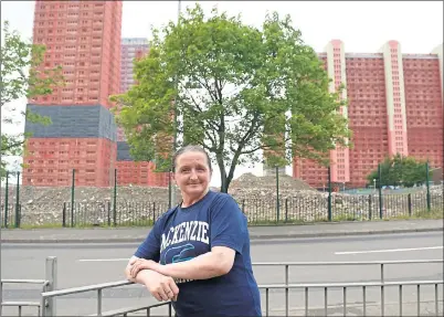  ??  ?? FED-UP: Angela Cooke, a former tenant at the Red Road flats in Glasgow, which are due to be demolished in the autumn.
Picture: Nick Ponty