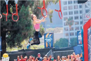  ?? EDDY CHEN/UNIVERSAL KIDS ?? Thirteen-year-old Bernalillo resident Katie Bone competes on “American Ninja Warrior Junior” in Los Angeles.