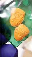  ??  ?? This unlocated handout picture released by the Indiana State Police shows Donald Trump-shaped Esctasy pills stamped with the logo ‘Great Again’ on the back which were found during ‘Operation Blue Anvil,’according to a statement released by Indiana...