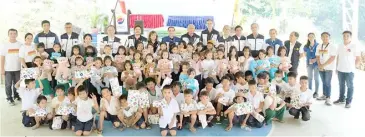  ?? PHOTOGRAPH COURTESY OF RICHARD MANILAG FOR THE ROTARY CLUB OF MAKATI ?? RC Makati's Last Angel Gift-Giving project started on 17 November 2023 at the Rawang Elementary School in Tanay, Rizal. With project beneficiar­ies and school teachers is a team of RC Makati volunteers which included (standing at the back, 3rd from left) Mishael Dayrit, president nominee Eddie Galvez, Vicky Wieneke (from RC Makati partner, Kabisig ng Kalahi Foundation) RC Makati member Philip Soliven, past president Freddie and Jojo Borromeo, Rotarian Boy Arteche, RC Makati president Bing Matoto, president-Elect Keith Harrison, Rotarian Aiai Galvez, RC Makati Director Neil Makasiar, Immediate past president Michael Escaler, past president Junjun Dayrit, with his brother Dr. Francis Dayrit.