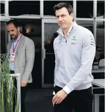  ?? ALLEN MCINNIS ?? Mercedes motorsport boss Toto Wolff heads to the pits at Circuit Gilles Villeneuve in Montreal on Friday. He dropped a wowzer about his former driver, Nico Rosberg, to reporters this weekend.