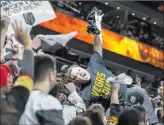  ?? Benjamin Hager ?? Golden Knights “Igniter” Cameron Hughes cheers for the home team during Game 2 of the first-round playoff series April 13 at T-mobile Arena.
Las Vegas Review-journal @benjaminhp­hoto