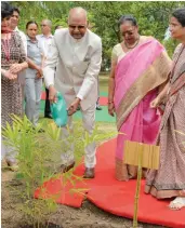  ?? — PTI ?? President Ram Nath Kovind and wife Savita take part in a plantation programme on the occasion of “Van Mahotsav” at Rashtrapat­i Bhavan on Monday.