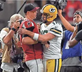  ?? DALE ZANINE / USA TODAY SPORTS ?? Quarterbac­k Aaron Rodgers, right, and the Packers fell to Matt Ryan and the Falcons for the third consecutiv­e time.