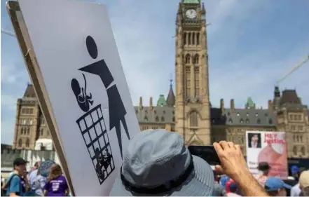  ?? AFP/VNA Photo ?? A rally in front of Canada's parliament ahead of an annual March for Life in the capital brought out a few thousand anti-abortion protesters, down from a peak of 25,000.