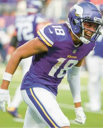  ?? BRUCE KLUCKHOHN/AP ?? Vikings wide receiver Justin Jefferson celebrates after catching a 36-yard touchdown pass during the first half in Week 1 against the Packers in Minneapoli­s.