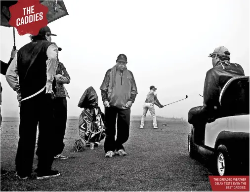  ??  ?? THE DREADED WEATHER DELAY TESTS EVEN THE BEST CADDIES.