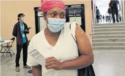  ??  ?? DAVID RIDER TORONTO STAR
Pauline Baldwin got her first COVID-19 vaccine shot at a clinic inside Warden subway station on Thursday because of the vaccine passports.