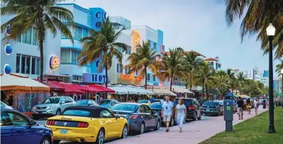  ?? ?? Strict: Visitors to America, including Miami in Florida, above, face rigorous regulation­s