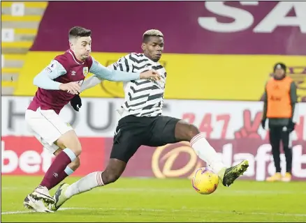  ??  ?? Manchester United’s Paul Pogba tries to control the ball during the English Premier League soccer match between Burnley and Manchester United in Burnley, England, on Jan 12. (AP)