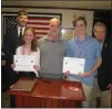  ?? PHOTOS COURTESY OF VFW 3460 ?? VFW Post 3460leader­s present awards to the Patriot’s Pen essay contest winner Alice Paynter and the Voice of Democracy essay winner Otto Heckendorn.