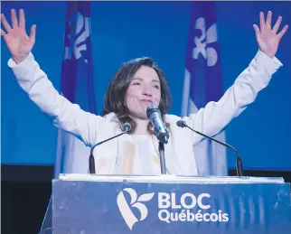  ?? PAUL CHIASSON/THE CANADIAN PRESS ?? New Bloc Québécois leader Martine Ouellet salutes supporters Saturday in Montreal. She called on sovereignt­ists to rally behind her to protect the “green jewel” that is Quebec.