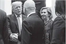  ?? AP PHOTO/EVAN VUCCI ?? Deputy National Security Adviser Mira Ricardel, right, watches as President Donald Trump arrives for a Diwali ceremonial lighting of the Diya on Tuesday at the White House.