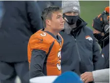  ?? Helen H. Richardson, The Denver Post ?? Broncos quarterbac­k Drew Lock looks dejected on the sideline as the game winds down in the fourth quarter on Sunday. The Chiefs beat the Broncos 43- 16.