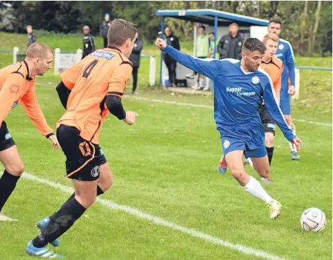  ??  ?? Lochee United’s Grant Lawson in action against Bo’ness last week. The Bluebells lost 3-1. Pic by Chris Ritchie.