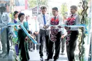  ??  ?? Sabry Ibrahim unveiling the relocated People’s Leasing Horana branch. Also in the picture; Sanjeewa Bandaranay­ake, Senior Deputy General Manager, Priyanka Wimalasena, Chief Manager and Nuwan Tharanga, Branch Manager, Horana