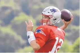  ?? STEVEN SENNE/ASSOCIATED PRESS ?? New England quarterbac­k Tom Brady, who turned 42 on Saturday, is expected to sign a two-year, $70 million extension, a person with knowledge of the deal told the AP.