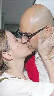  ?? TATAN SYUFLANA/ THE ASSOCIATED PRESS ?? Canadian teacher Neil Bantleman, shown with his wife Tracy, was sentenced to 10 years in prison Thursday by an Indonesian court.