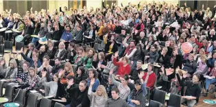  ?? PHOTO: STEPHEN JAQUIERY ?? Hands up . . . Dunedin primary school teachers are asked to raise their hand if they feel overwhelme­d by the workload of their job.