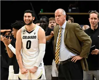  ?? CLIFF GRASSMICK — DAILY CAMERA ?? Colorado’s Luke O’brien and head coach Tad Boyle stand on the sideline during a game against Milwaukee in Boulder on Tuesday.