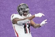  ?? Star Tribune/TNS ?? Julio Jones, the Falcons’ all-time leading receiver over 10 years with the team, was traded to the Titans on Sunday for a pair of draft picks.