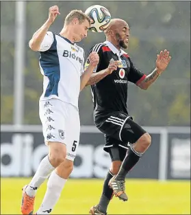  ?? Picture: GALLO IMAGES ?? HEAD TO HEAD: Wits’ Giorgi Nergadze competes with Pirates’ Oupa Manyisa during the MTN8 semifinal first leg at the weekend