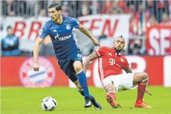  ?? FOTO: DPA ?? Diese Saison Gegner, ab dem Sommer womöglich in einem Team: Leon Goretzka (li.) und Arturo Vidal.