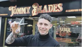  ?? ?? Tommy Blades barber shop owner Tom Ewel.