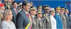  ?? FOTO: DPA ?? Nicolas Maduro (Zweiter von links) während der Parade, bei der Venezuelas Präsident nach Regierungs­angaben Ziel eines Anschlags wurde.