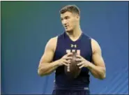  ?? GREGORY PAYAN — ASSOCIATED PRESS ?? North Carolina quarterbac­k Mitch Trubisky is seen in a drill at the NFL Scouting Combine on March 4. ESPN analyst Merrill Hoge doesn’t believe Trubisky can have instant NFL success.