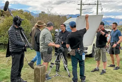  ?? STUFF ?? Two television series have been filmed in the Queenstown area in the past three months. Above, One Lane Bridge star Dominic OnaAriki films final scenes for the show’s second season.
