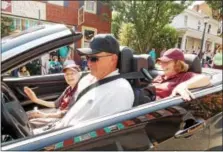  ?? LISA MITCHELL — DIGITAL FIRST MEDIA ?? Kutztown University 150th Anniversar­y Parade grand marshal was 100-year-old Grace Shankweile­r, a 1935 graduate of Kutztown State Teachers College, left front seat.