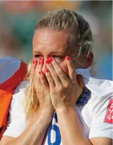  ?? KEVIN C. COX/GETTY IMAGES ?? England’s Laura Bassett is inconsolab­le after scoring the own goal that gave Japan a 2-1 victory in Women’s World Cup semifinal action Wednesday.