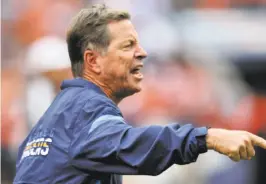  ?? Jack Dempsey / Associated Press 2011 ?? Norv Turner, here as head coach of San Diego in 2011, didn’t have as much success (114-122-1 record) as he has shown as an offensive coordinato­r.