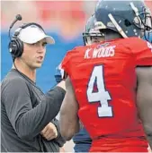 ?? JIM RASSOL/STAFF PHOTOGRAPH­ER ?? FAU offensive coordinato­r Kendal Briles, above, will call the plays this season. This is the first time head coach Lane Kiffin has given up that duty.