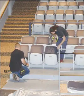  ?? Raissa TeTanish/Truro Daily news ?? A crew with Precision Office Assemblies spent Monday morning dismantlin­g the 204 seats at the Marigold Cultural Centre before installing new, upgraded seating.