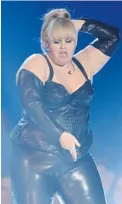  ??  ?? Host Rebel Wilson, above, performs onstage during the 2013 MTV Movie Awards. Actor Brad Pitt, below, is one of the show’s presenters.