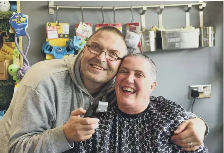  ??  ?? Mags Glover and husband Gary after he shaved her head for the Macmillan Brave the Shave campaign.