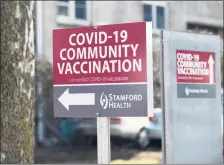  ?? Tyler Sizemore / Hearst Connecticu­t Media ?? A COVID-19 vaccinatio­n “super site” in Stamford last month. Everyone in the state 16 and over is now eligible.