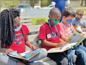  ??  ?? Northwest Elementary students were visually ecstatic when gifted books by the El Dorado Kiwanis Club. (Marvin Richards/News-Times)