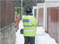  ?? Picture: Kim Cessford. ?? Police on Hazel Road, Alyth in March.